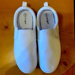 Size 6 girls, white slip on tennis shoes.  NEW!